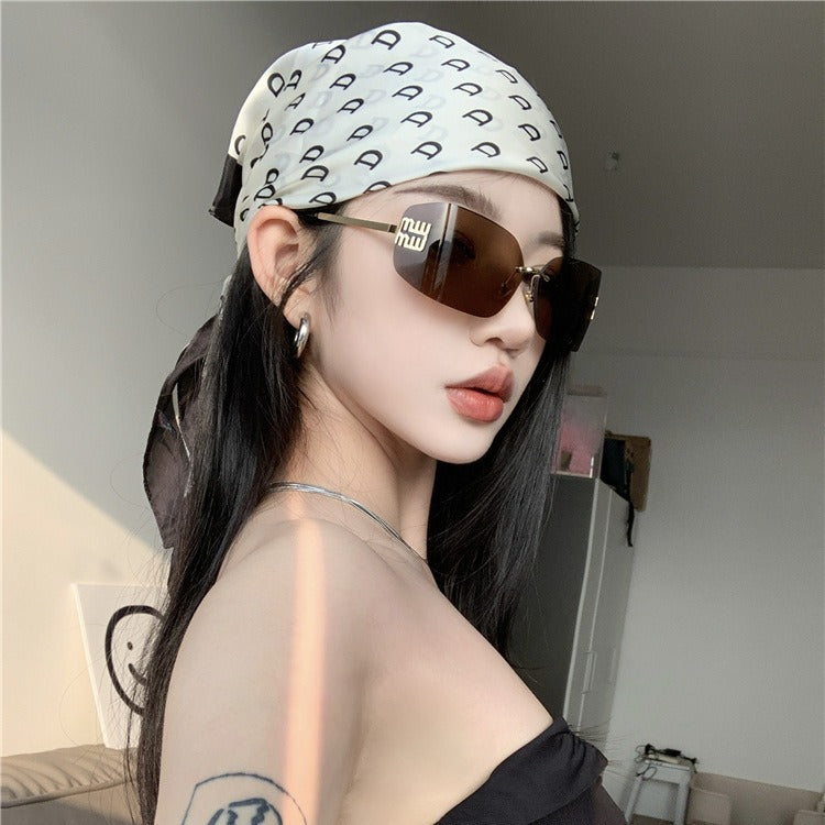 时尚无框墨镜男高级感网红出街轻奢千金风茶色防紫外线女士太阳镜