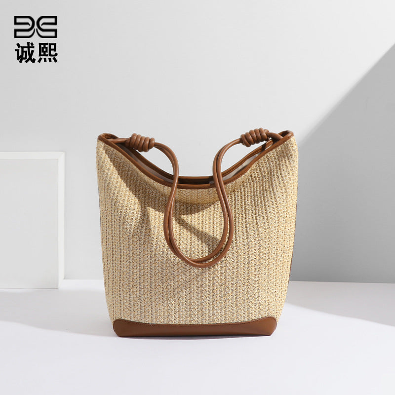 小众设计新款包包女简约拉菲草旅行海边草编包沙滩包单肩包托特包