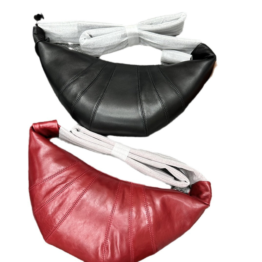 L家牛角包小众羊皮可颂包休闲饺子包真皮小号斜挎流浪胸包 批发