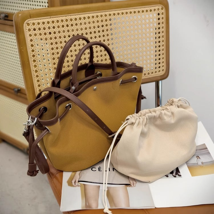 韩版休闲百搭ins通勤帆布包包女2025夏季手提斜跨包真皮托特包潮