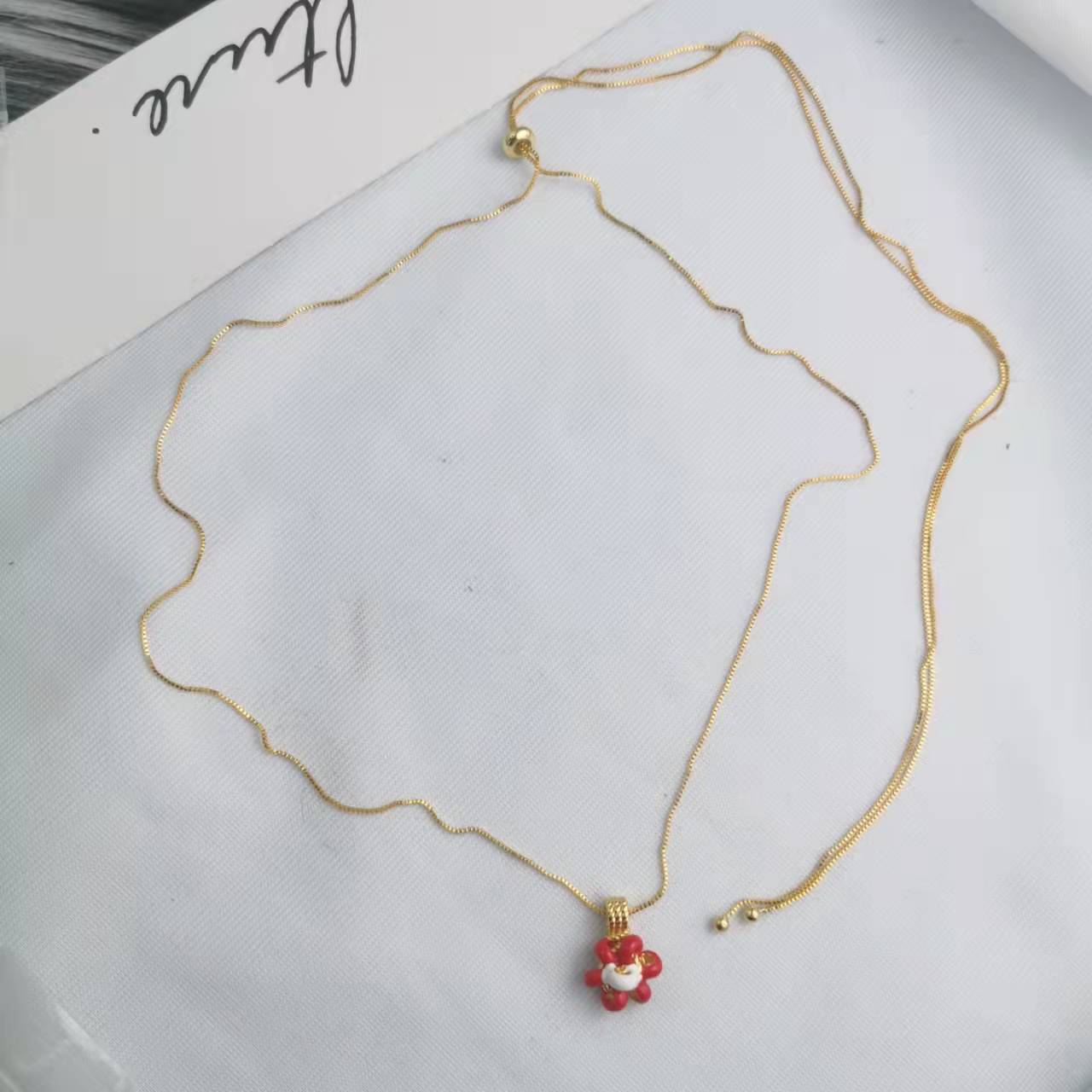 BV家22新款珐琅拼色小花项链女高级感气质花朵长款可抽拉毛衣链