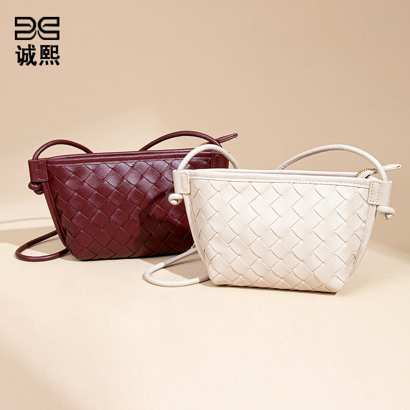 新款纯色百搭斜跨编织女包休闲创意零钱包小巧可爱mini复古饺子包