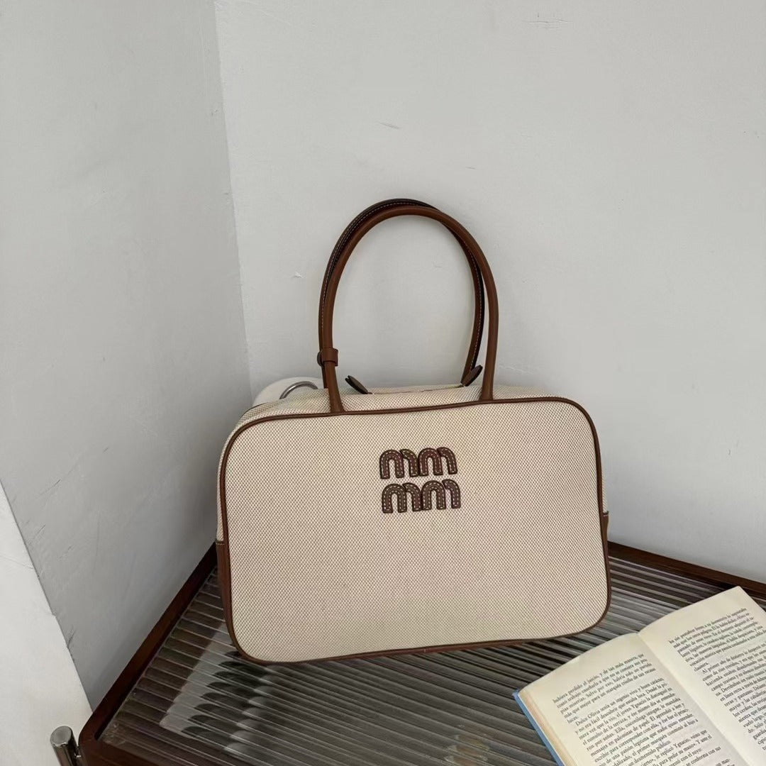 大容量手提包包女春夏2024新款时尚上班通勤枕头包单肩斜挎帆布包