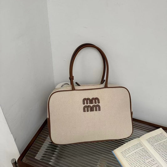 大容量手提包包女春夏2024新款时尚上班通勤枕头包单肩斜挎帆布包