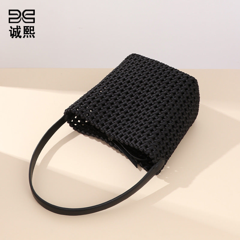 跨境潮流单肩包风车结镂空手拎水桶包高级感大容量女包子母腋下包