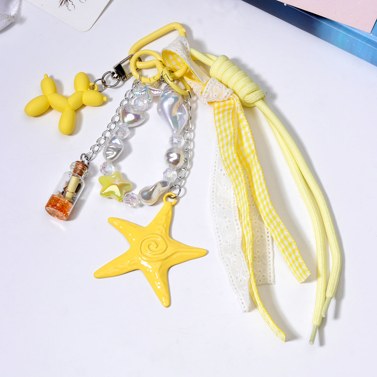 跨境货源义乌现货diy包包串珠挂件批发miu系包挂绳子手机链配饰