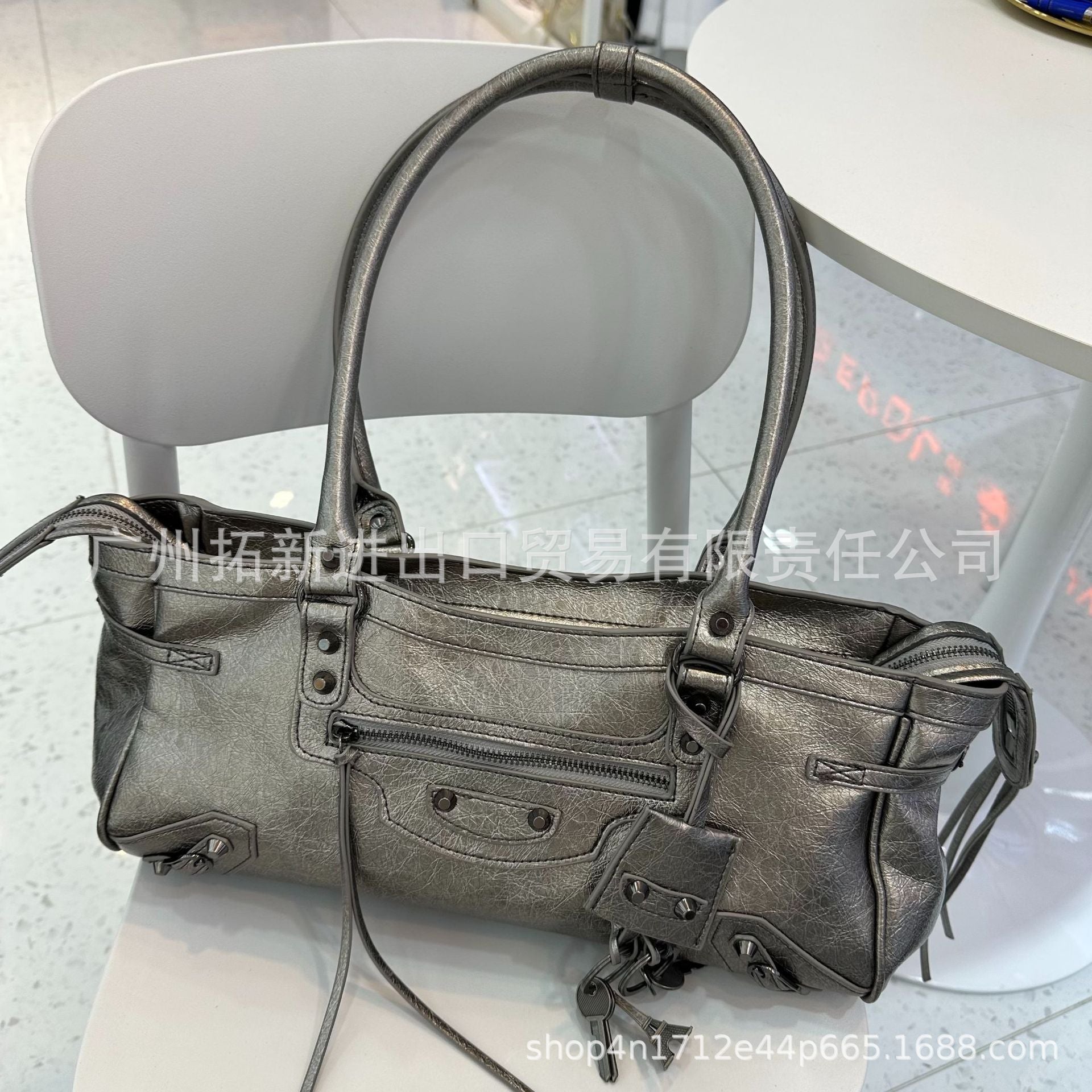 跨境新爆款B家lecity横款法棍铆钉流苏单肩包手提包包时髦简约女