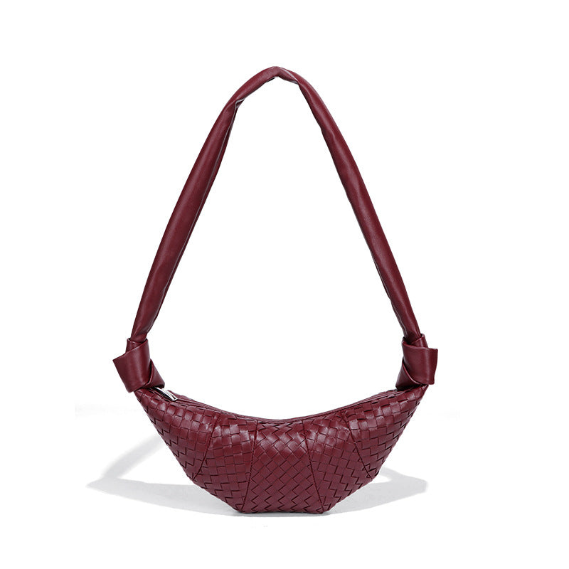 韩版慵懒风牛角包潮流单肩斜挎饺子包小众编织女包新款时尚可颂包