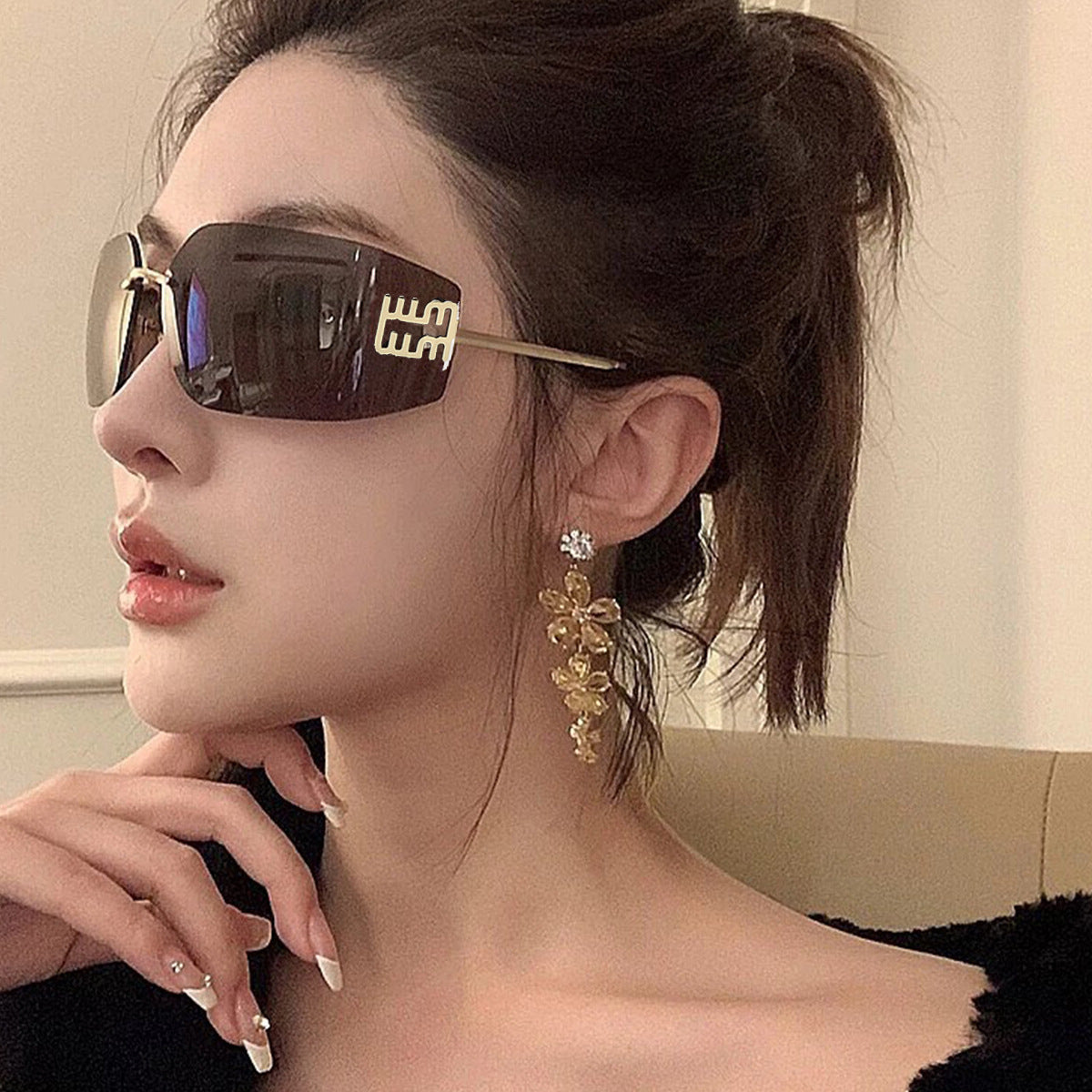 时尚无框墨镜男高级感网红出街轻奢千金风茶色防紫外线女士太阳镜