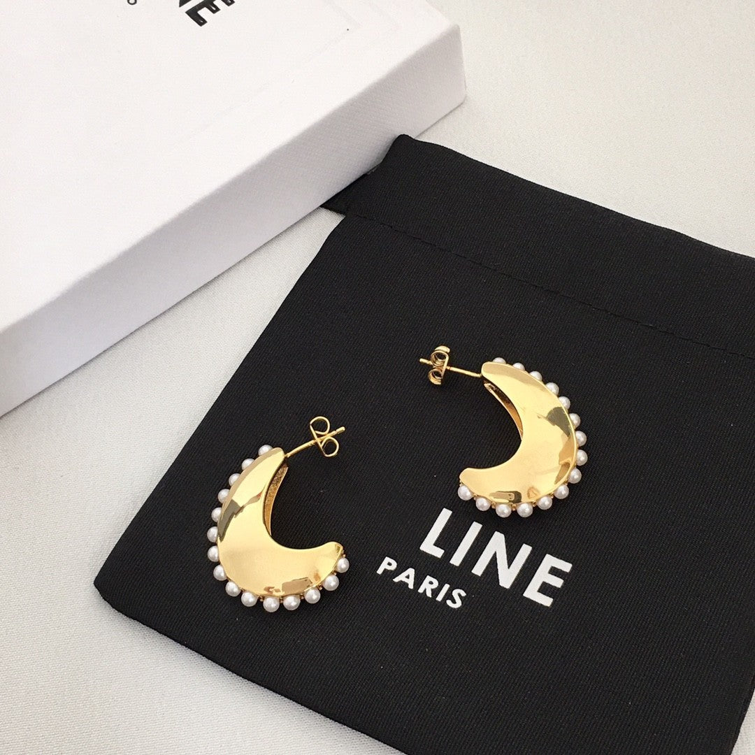 赛林家新款月亮珍珠耳钉女高级感个性气质黄铜镀金月牙耳环