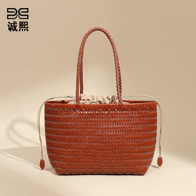 牛皮复古菜篮子手提托特女包个性手工编织包休闲度假风单肩腋下包