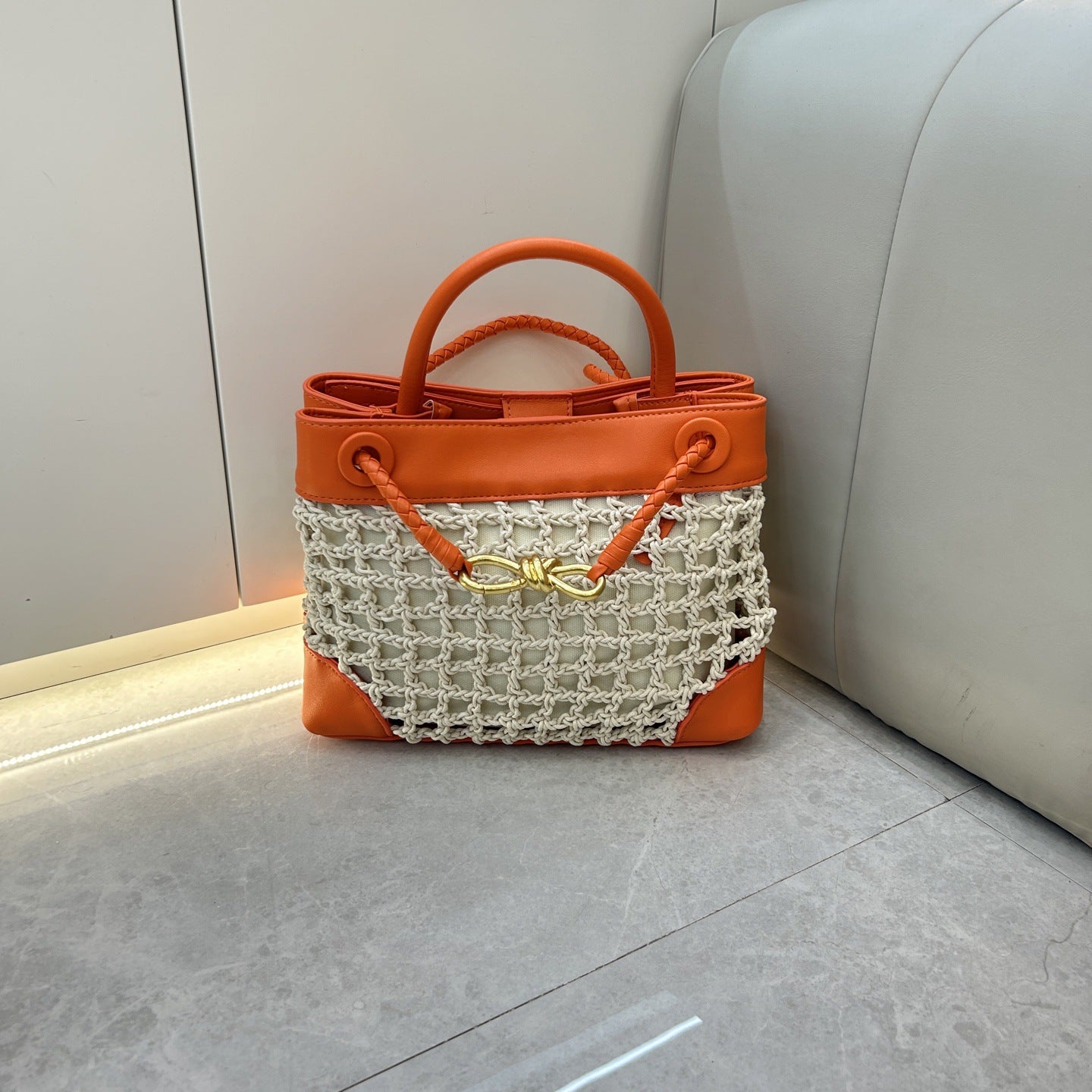 速卖通2025爆款拉菲草金属蝴蝶结托特包简约撞色手拎斜挎托特包包