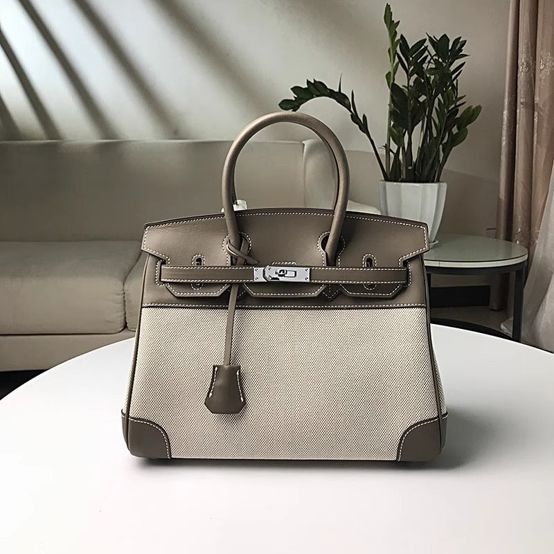 高品质时尚简约铂金包帆布拼接swift牛皮女包休闲桶包手提单肩包