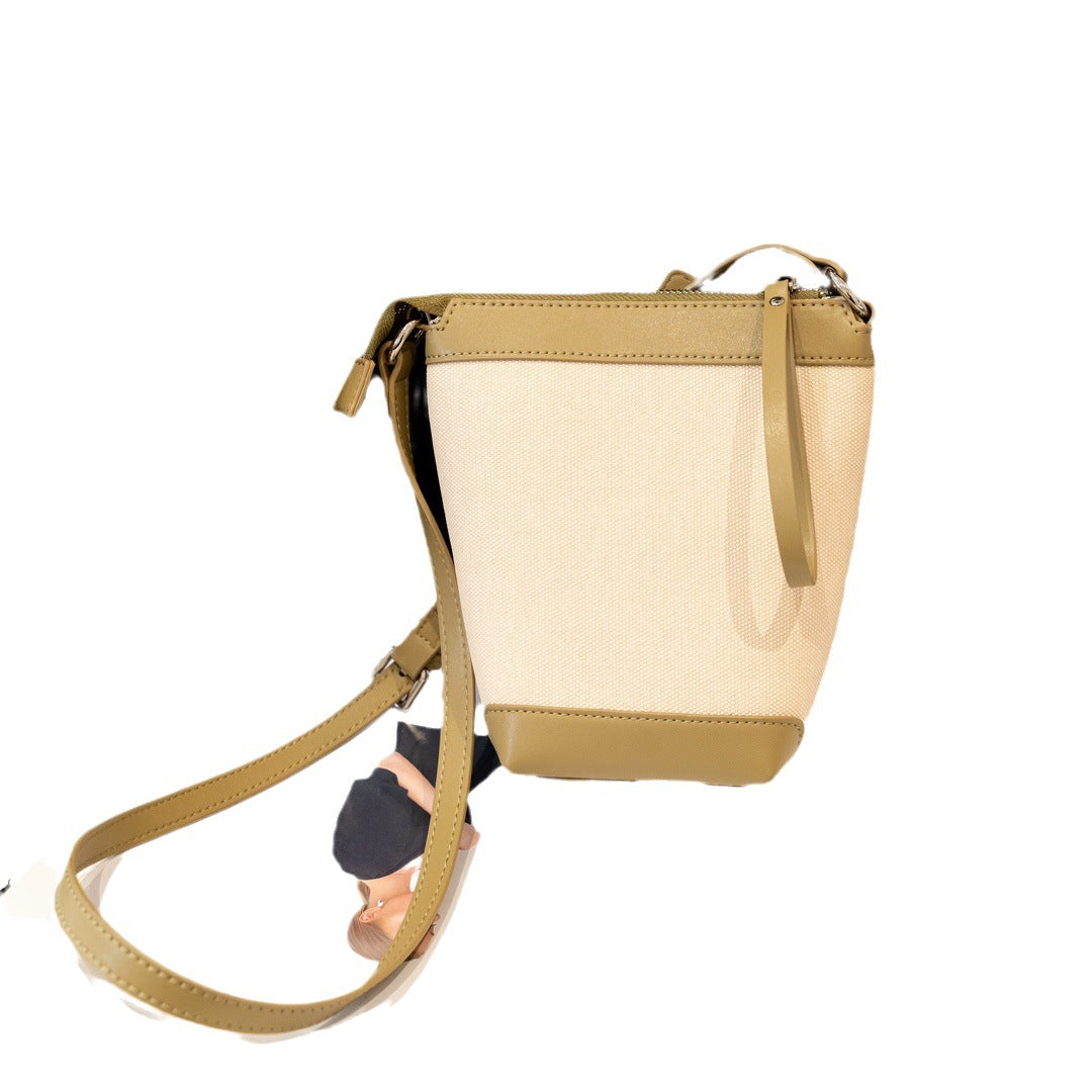 牛皮帆布拼接mini水桶包包女2023夏季单肩斜跨包韩版休闲手机包潮