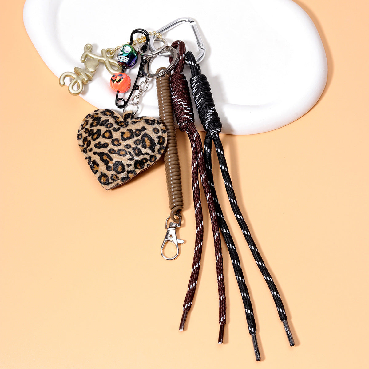 工厂原创diy包包挂件PU皮革五角星挂件亚克力桃心纽扣串珠编织绳