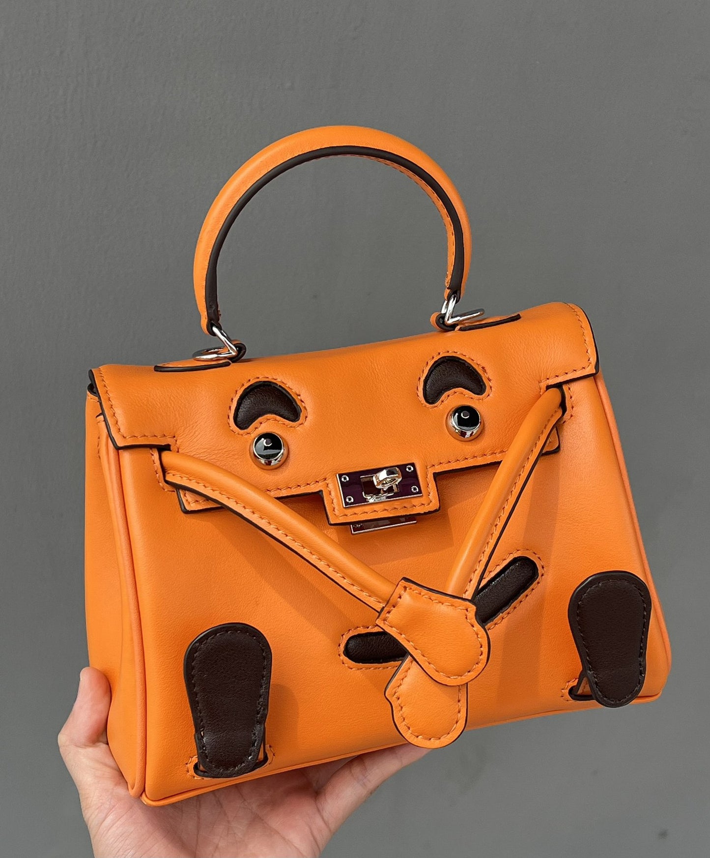 2025春季高级感头层牛皮笑脸包 千禧娃娃迷你凯莉包可爱斜挎包