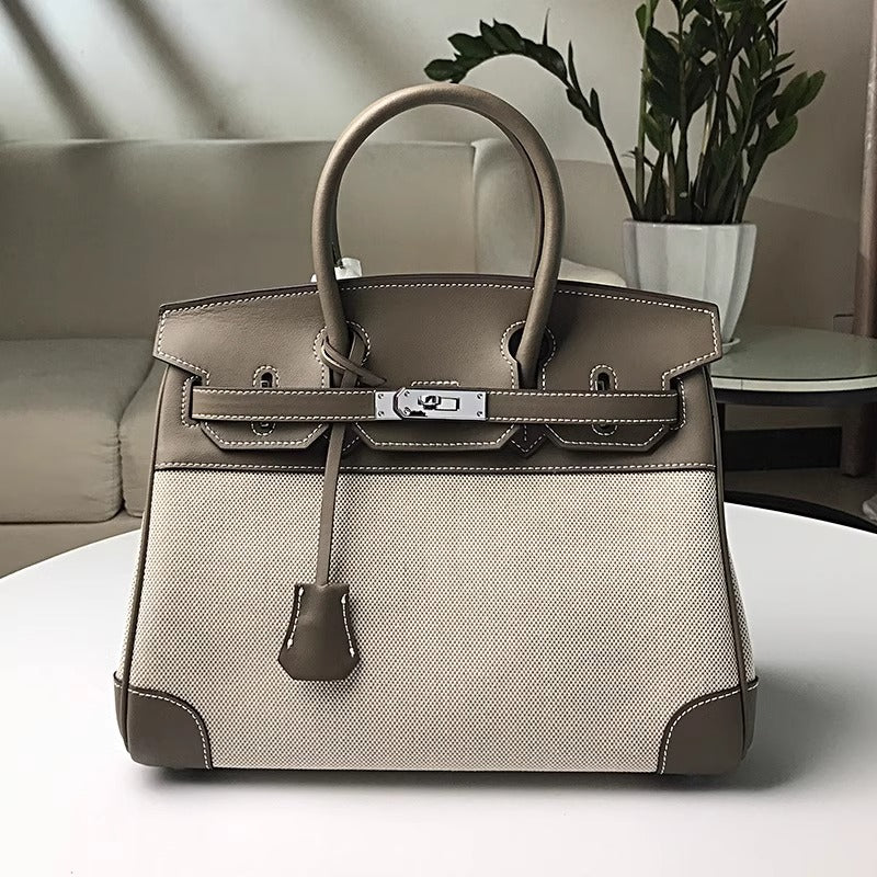 高品质时尚简约铂金包帆布拼接swift牛皮女包休闲桶包手提单肩包