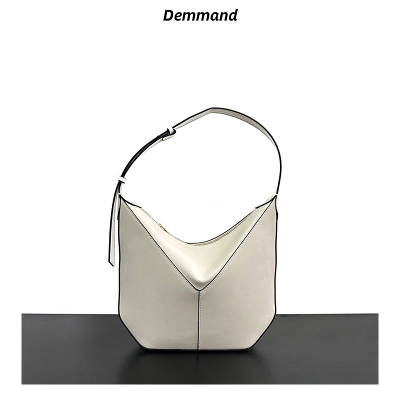 2024新款小牛皮高级感小众设计黑边手提单肩斜挎腋下包真皮吊床包