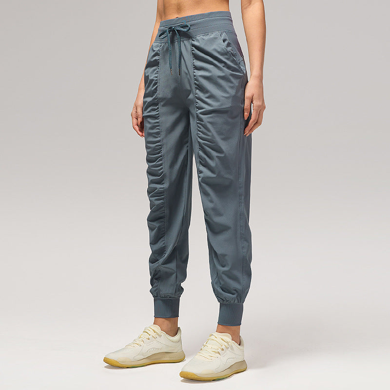 休闲宽松运动裤女压褶跑步瑜伽健身裤九分口袋速干透气束脚卫裤