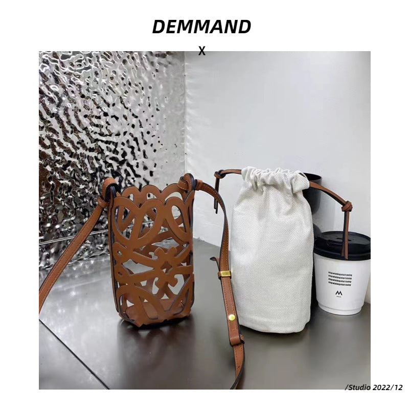 欧货品质女包2023新款水桶包复古文艺牛皮镂空个性单肩斜挎包包