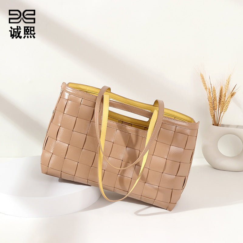 外贸跨境批发包包女手工编织高级时尚PU镂空简约撞色大容量托特包