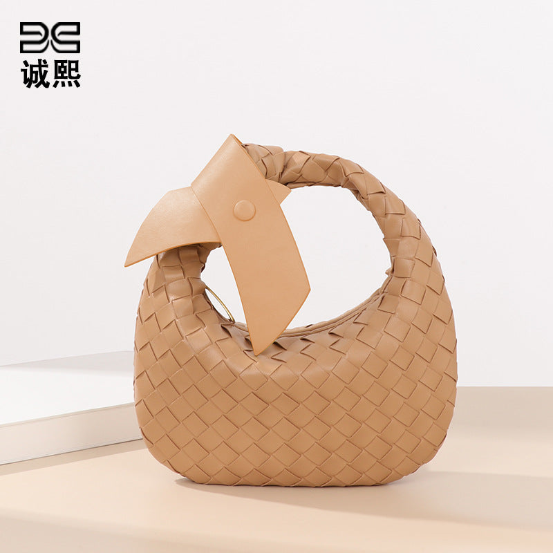 跨境潮流编织女包高级感手提百搭简约饺子包夏季休闲蝴蝶结牛角包