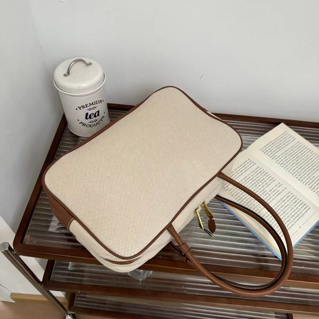 大容量手提包包女春夏2024新款时尚上班通勤枕头包单肩斜挎帆布包