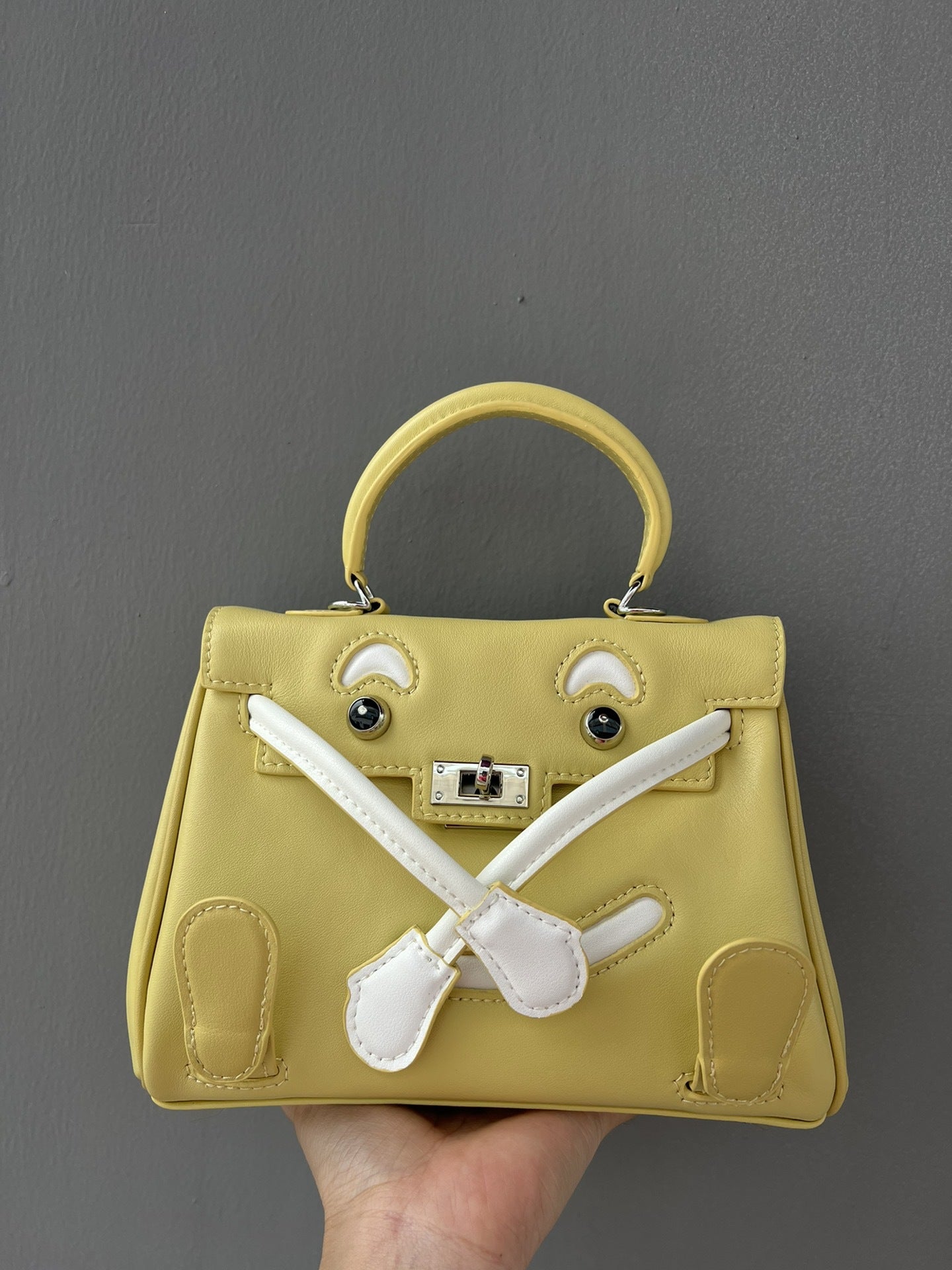 2025春季高级感头层牛皮笑脸包 千禧娃娃迷你凯莉包可爱斜挎包