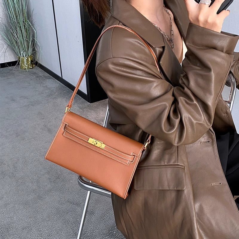 腋下包包女春夏2024新款通勤法棍包斜挎包高级质感复古单肩凯莉包