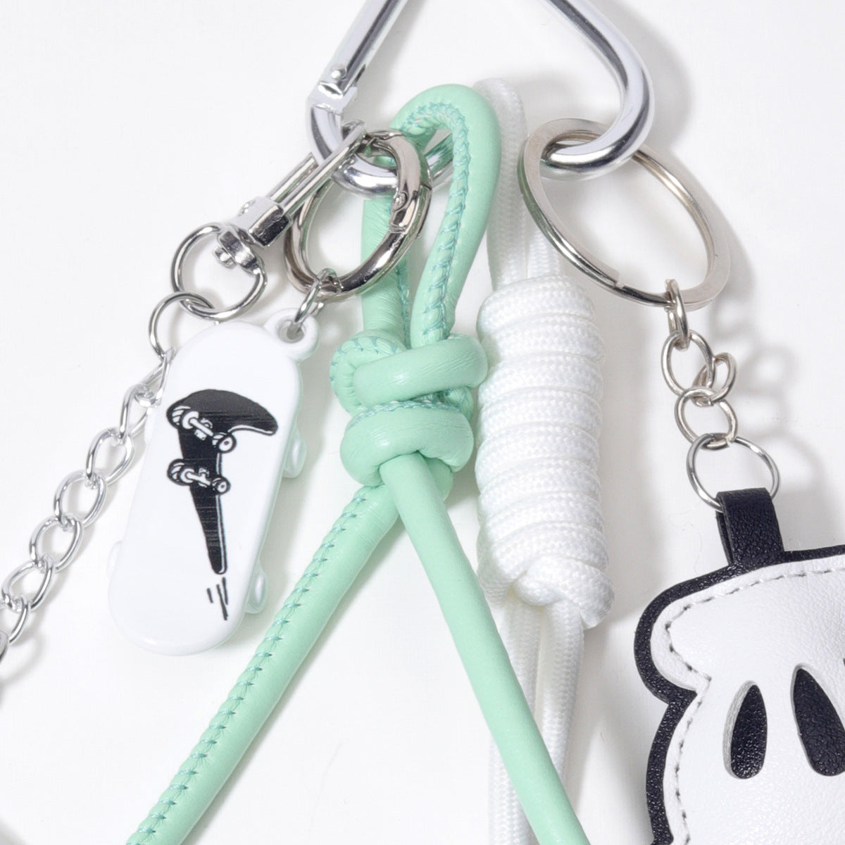 源头工厂量大价优白色黑边打手掌滑板车包挂钥匙链钥匙扣五角星