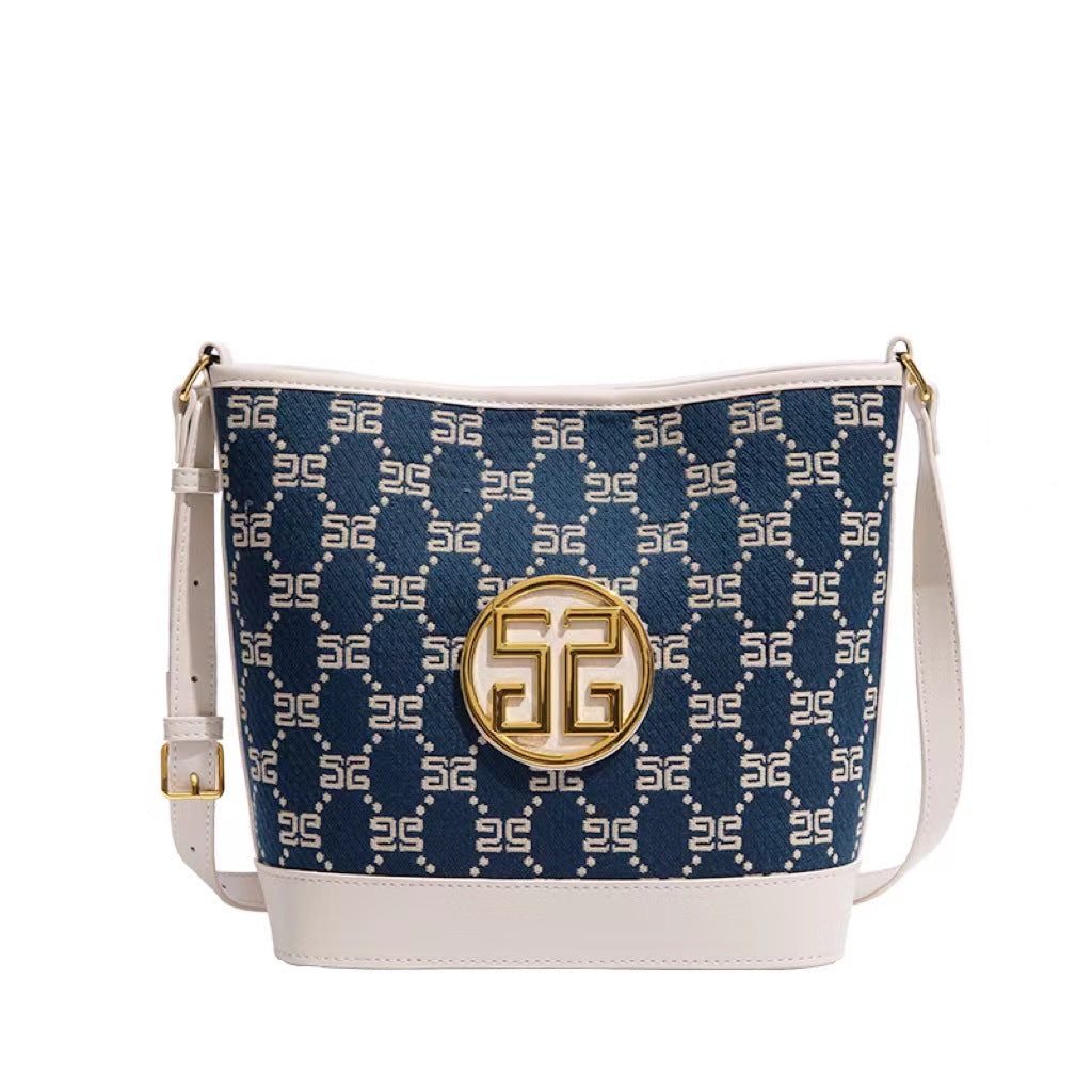 跨境夏季女高级感单肩斜挎水桶包小众印花棉麻pu大容量简约子母包