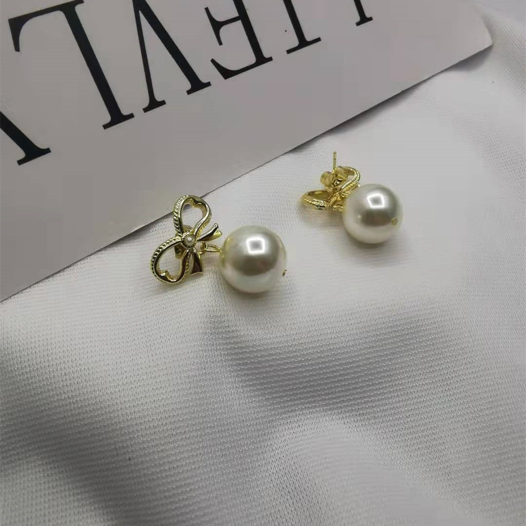 赛家21新款蝴蝶结耳钉珍珠耳坠女高级感甜美INS风几何形镀金耳环