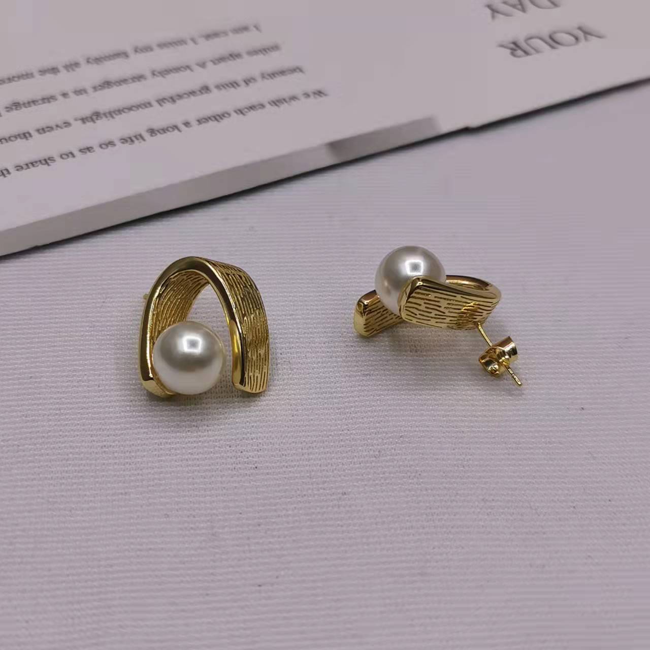 赛家21新款不规则曲面珍珠耳钉女高级感气质法式几何弧形耳环