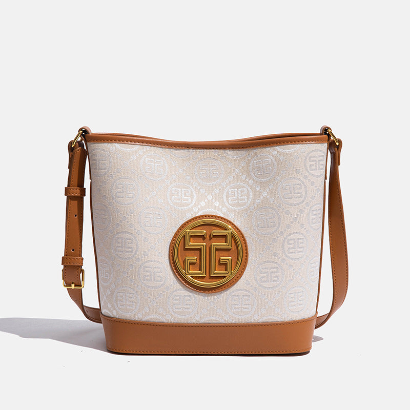 跨境夏季女高级感单肩斜挎水桶包小众印花棉麻pu大容量简约子母包