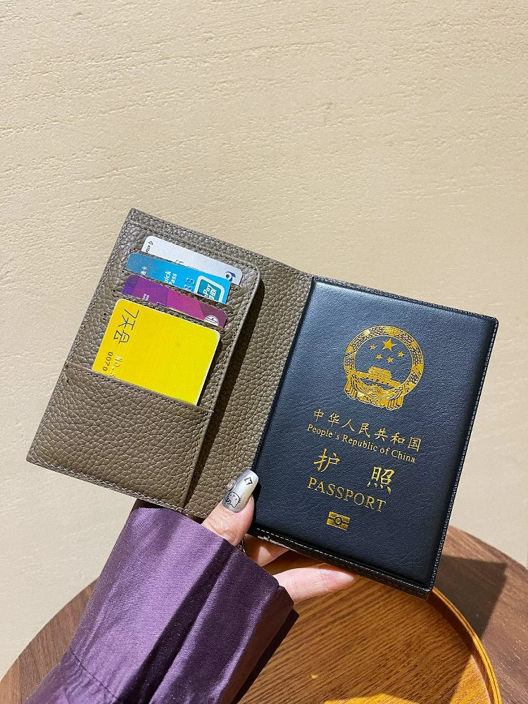 H真皮护照包多卡位证件保护套护照夹机票驾驶证收纳包两折钱包女