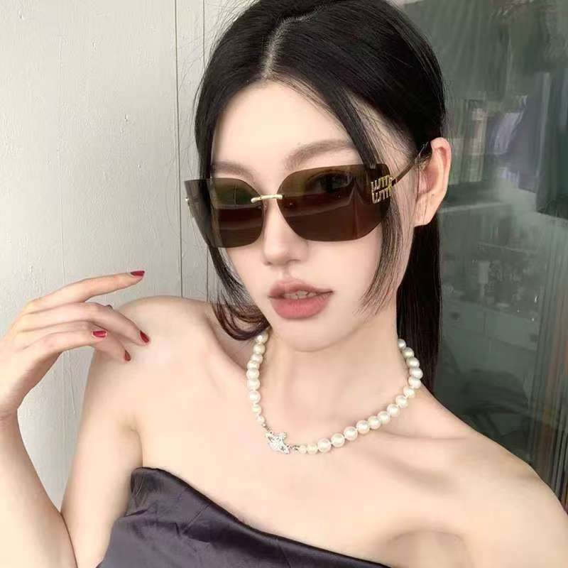 时尚无框墨镜男高级感网红出街轻奢千金风茶色防紫外线女士太阳镜