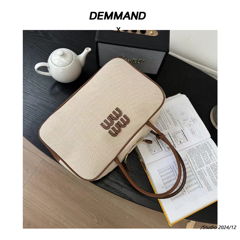 大容量手提包包女春夏2024新款时尚上班通勤枕头包单肩斜挎帆布包