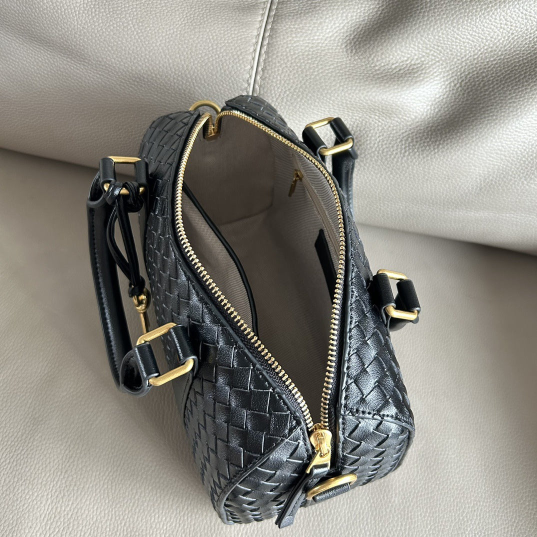 编织牛皮波士顿枕头包2024秋冬新款手工时尚通勤单肩斜挎包手提包