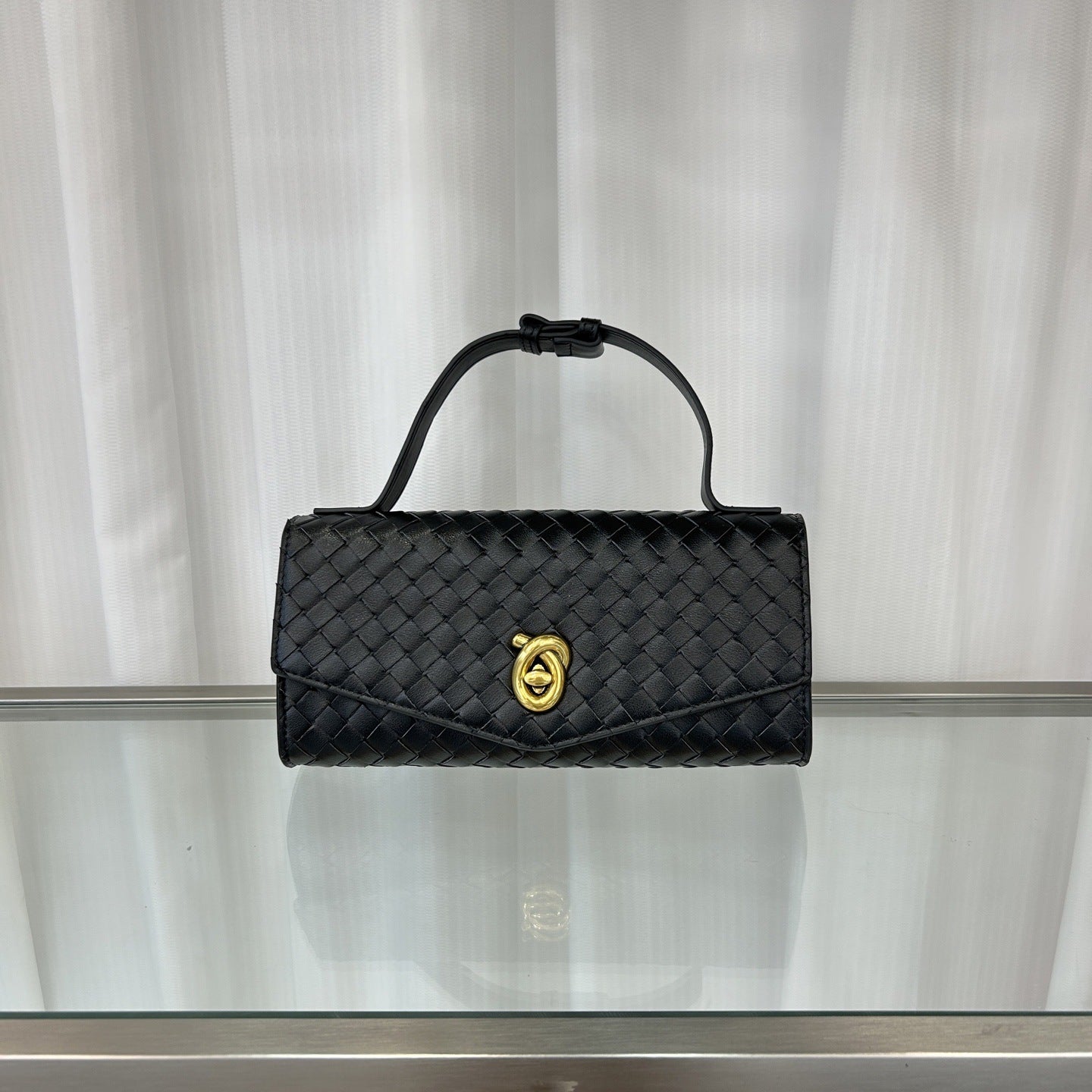 2025春夏新款knotlock牛皮信封包跨境时尚编织包单肩腋下手提包女