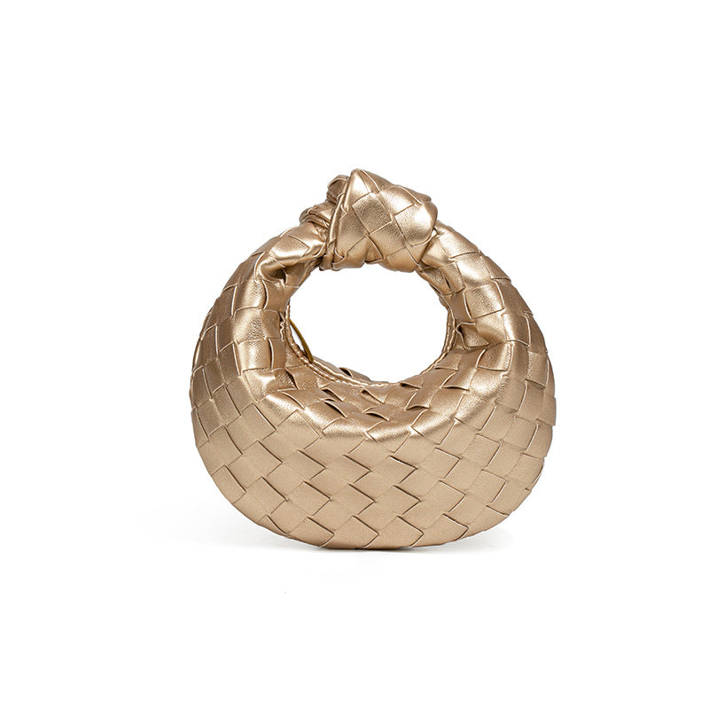 外贸新品时尚手拎饺子包打结手工编织女包百搭mini质感纯色牛角包