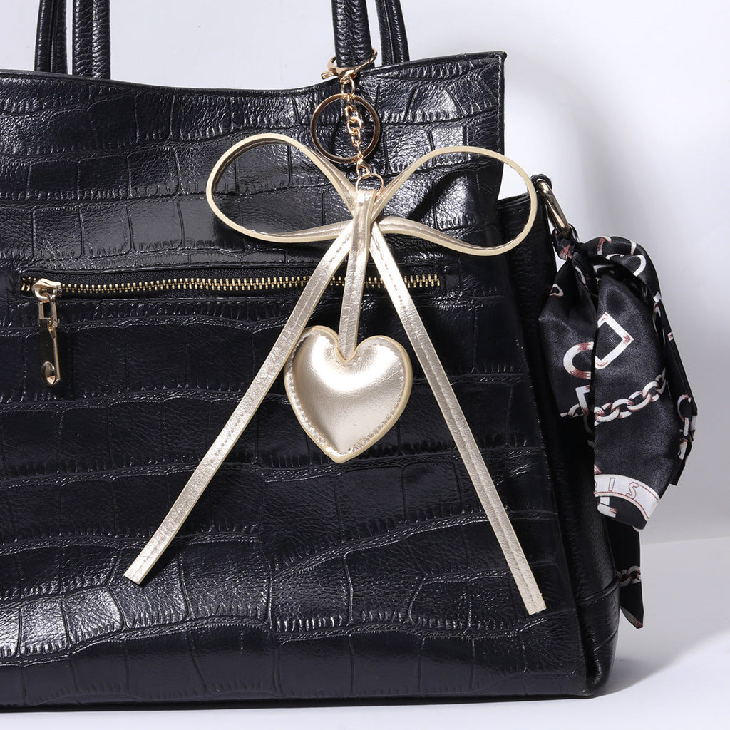 现货PU皮质桃心爱心蝴蝶结钥匙扣包挂diy包包挂件批发miu系包挂