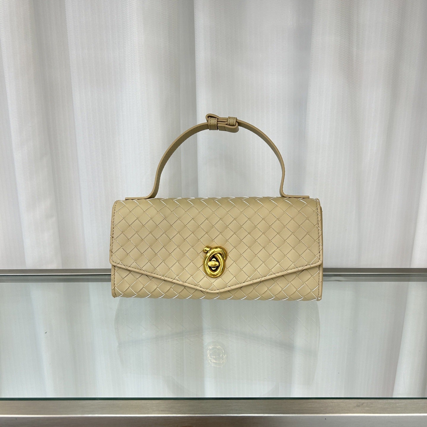 2025春夏新款knotlock牛皮信封包跨境时尚编织包单肩腋下手提包女