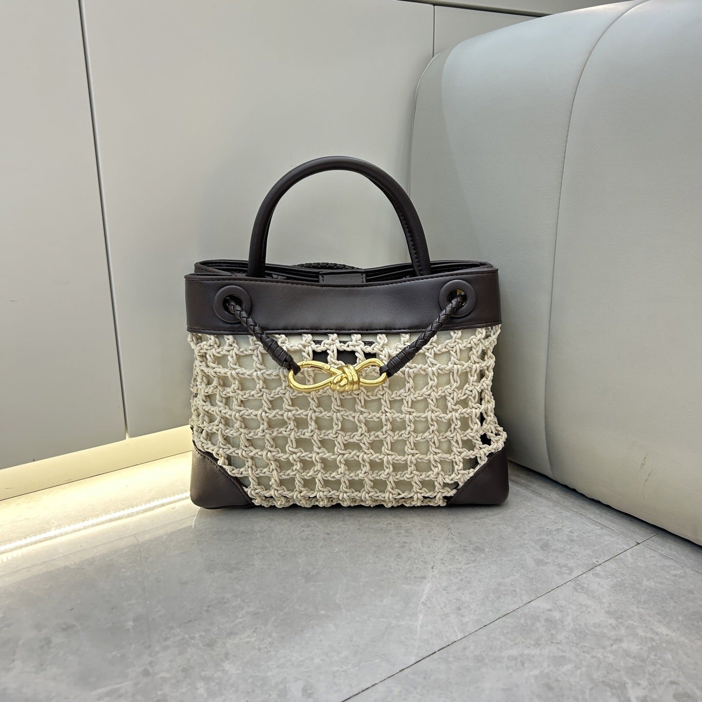 速卖通2025爆款拉菲草金属蝴蝶结托特包简约撞色手拎斜挎托特包包