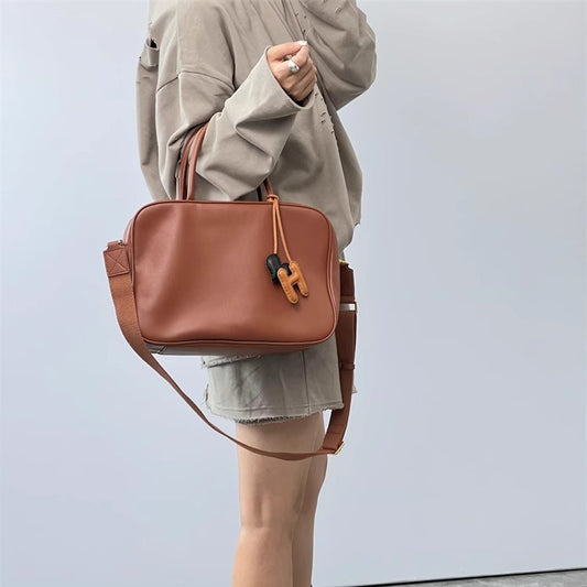 旅行包复古做旧公文包大容量通勤电脑包单肩斜挎真皮保龄球女包