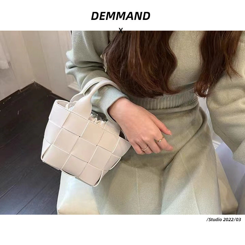 包包2022新款真皮女包编织牛皮单肩斜挎手提包手拎水桶简约时尚