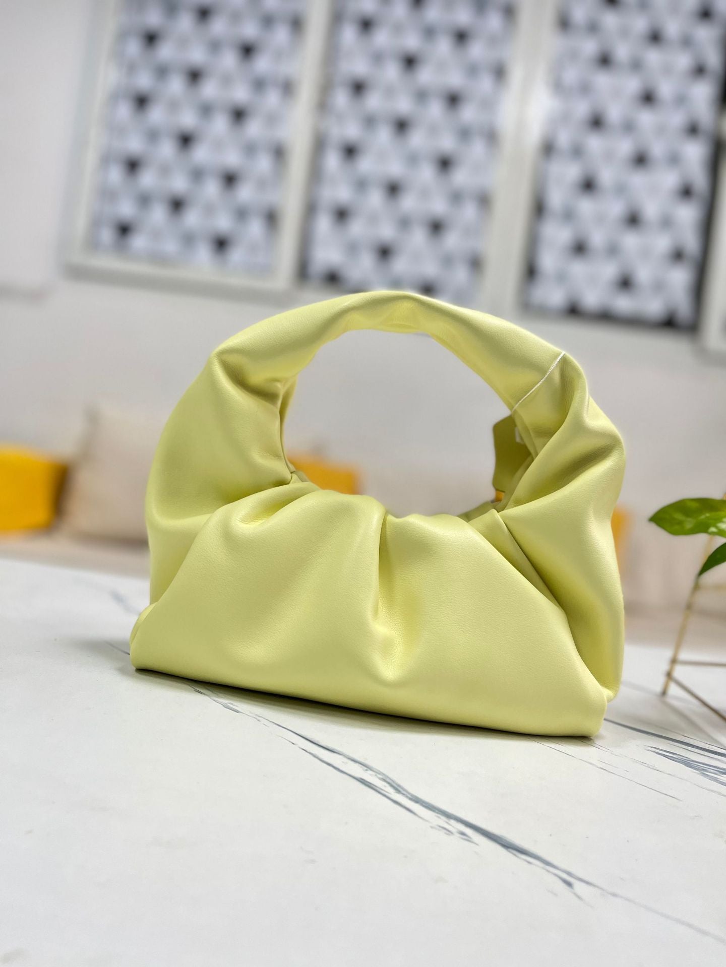 包包女2022新款女包牛角包pouch云朵包饺子包手提单肩包真皮女包