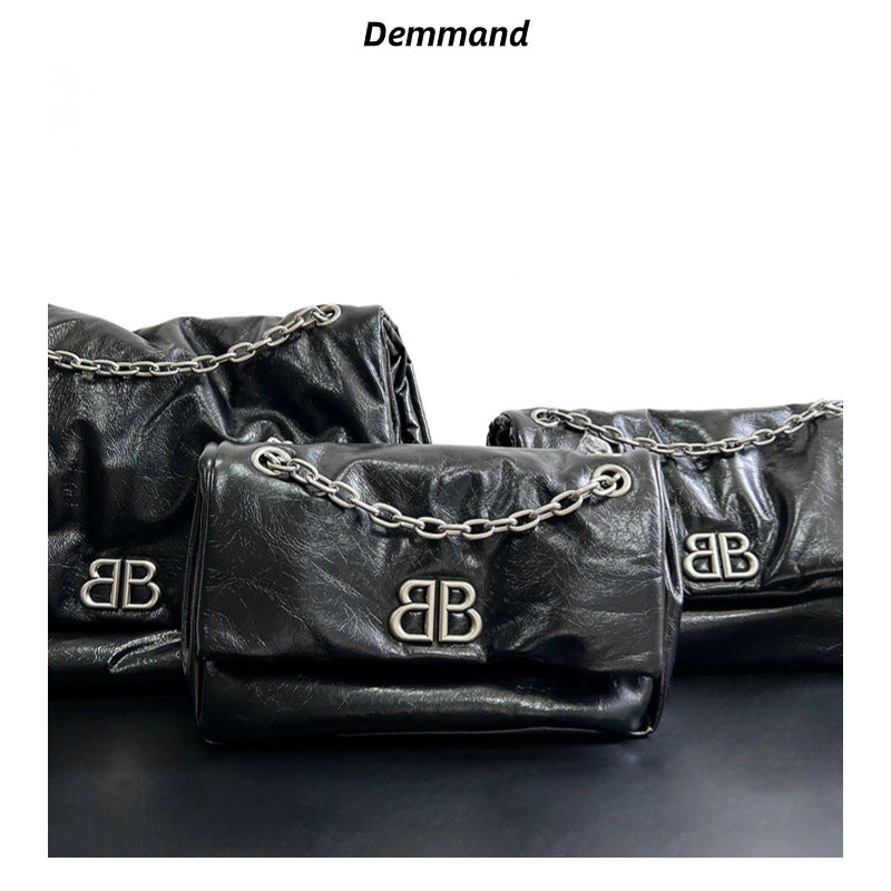 小众设计褶皱羽绒邮差包2023新款大容量甜酷女孩斜挎包单肩大包女