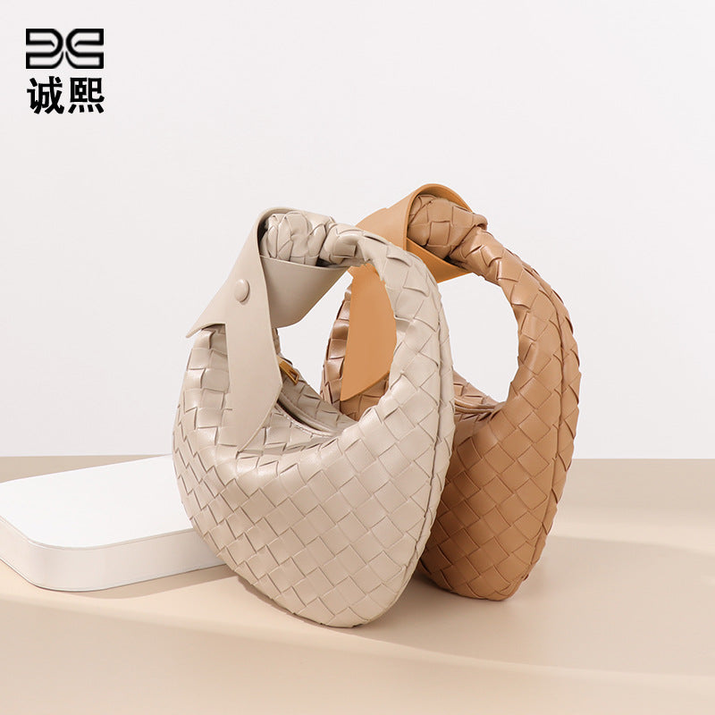 跨境潮流编织女包高级感手提百搭简约饺子包夏季休闲蝴蝶结牛角包