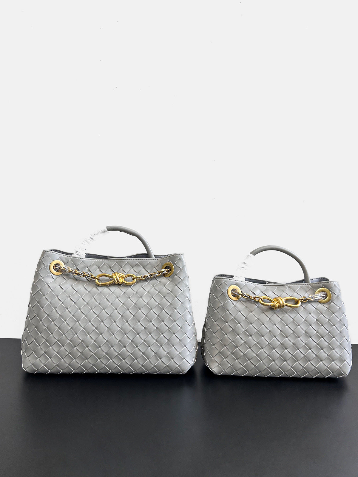 2024夏季新款编织蝴蝶结大容量真皮双肩女包单肩斜跨手提包