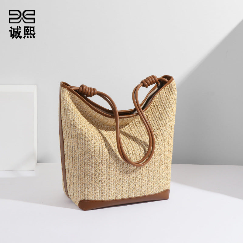 小众设计新款包包女简约拉菲草旅行海边草编包沙滩包单肩包托特包